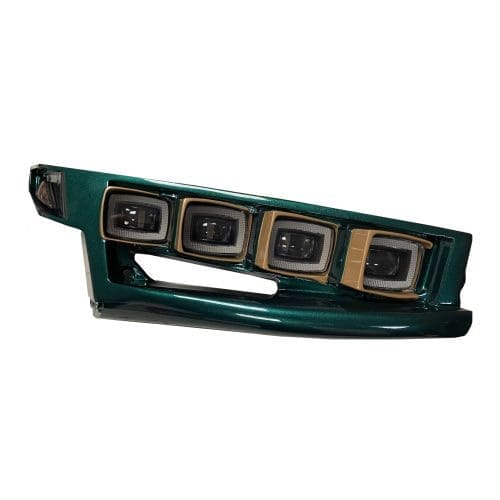 Green car front grille with four square headlights and a side indicator light.
