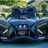 Sleek black Panther three-wheeled vehicle with futuristic design.