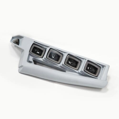 A sleek, modern gray car window control panel with four buttons.