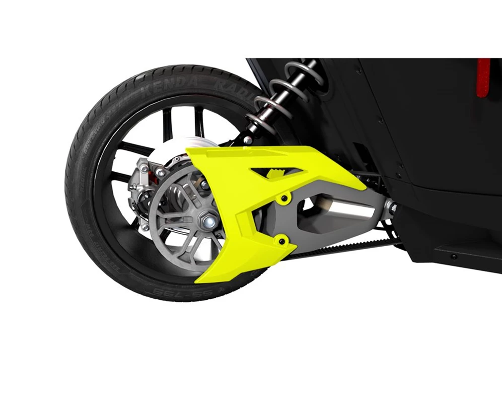 Close-up of a motorcycle's rear wheel with a yellow chain guard and suspension.