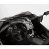 2881749_alternate3 Interior of a luxury sports car showcasing its steering wheel and dashboard.