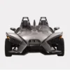 2881751_alternate1 Front view of a sleek, two-seater Polaris three-wheeled vehicle.