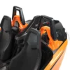 2882419-707_alternate3 Close-up of black and orange seats in a vehicle or simulator.