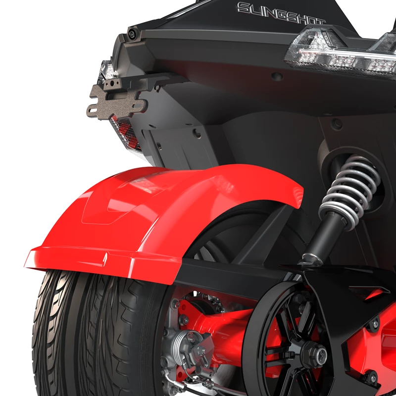 2883847-293_alt4 Close-up of a red and black electric scooter's rear wheel and suspension.