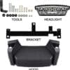 Car headlight mounting kit with bracket and tools.