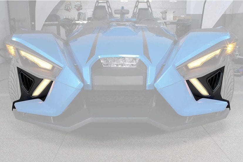 Futuristic blue vehicle with sleek angular design and illuminated accents.