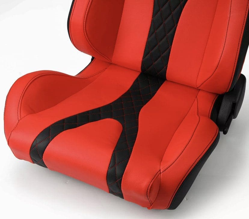 IMG_4960 Red and black racing-style car seat with diamond stitching.