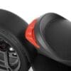 IMG_5044 Close-up of a black and red modern scooter seat and rear wheel.