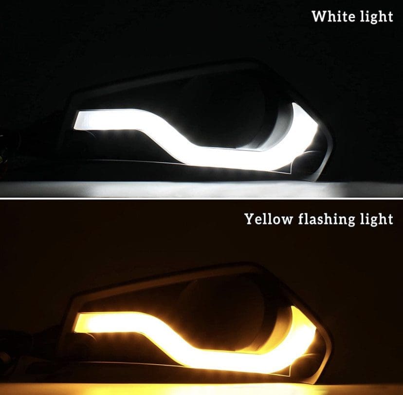 IMG_5377 Car headlight showing white light and yellow flashing light modes.