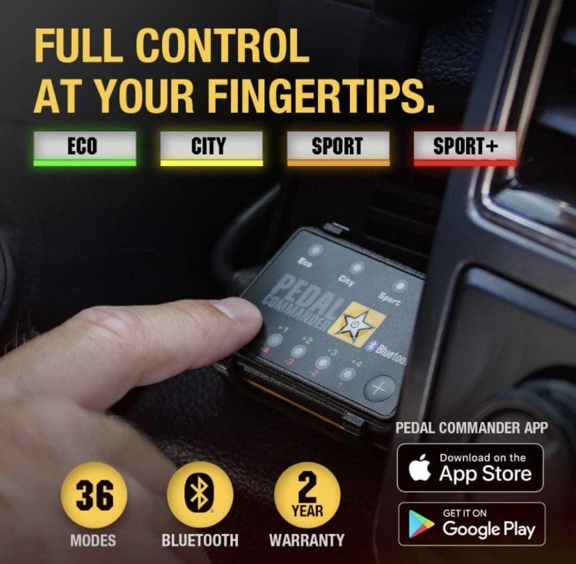IMG_7024 Hand holding a smartphone displaying a control app for a vehicle with various driving modes.