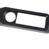IMG_7411 Carbon fiber car dashboard panel with circular and rectangular cutouts.
