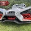 IMG_7663 A custom Polaris vehicle with aggressive design and Zarate Steel Works branding.