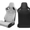 IMG_7892 Two racing-style car seats, one gray and one black.