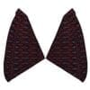 Two dark fabric pieces with red patterns, shaped like wings.