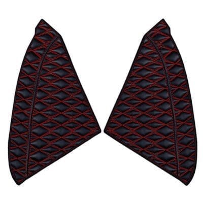 Two dark fabric pieces with red patterns, shaped like wings.