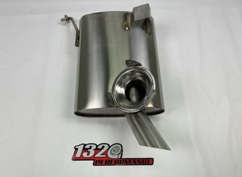 IMG-0032 Stainless steel automotive exhaust component with a curved pipe and mounting bracket.