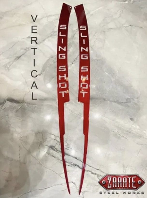 IMG_9696 Red hair sticks labeled 'SLING SHOT' on a marble surface.