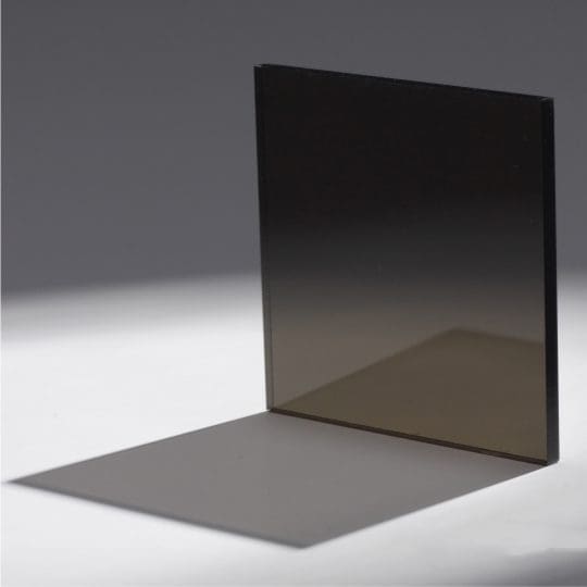 DarkGrey Square glass panel casting a shadow on a flat surface.