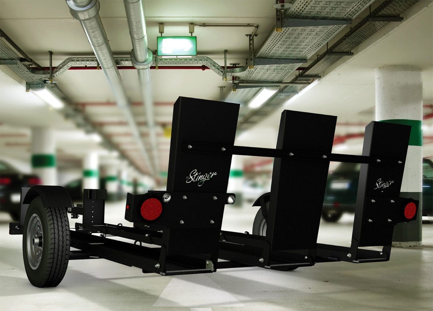 Close-up of a black metal parking sensor device in an underground garage.