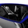 IMG-1703 (1) Close-up of a sleek blue car side mirror reflecting the interior.