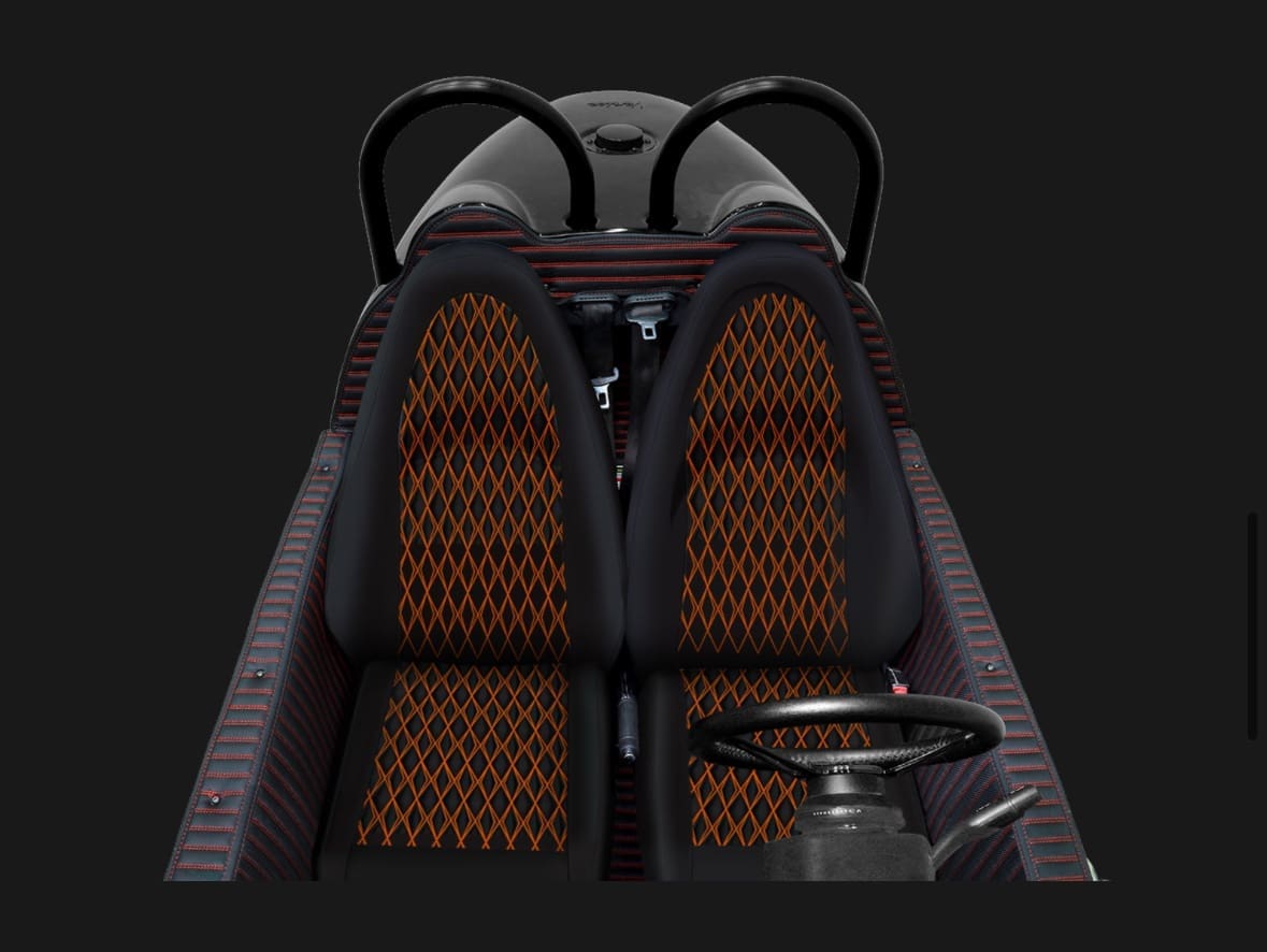 img_0899 Close-up of a car seat with a unique honeycomb pattern and a mounted speaker.
