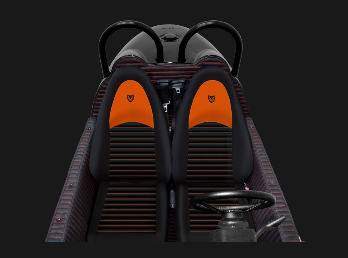 Sleek black and orange racing car seats with a modern dashboard.
