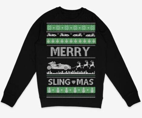 IMG_8559 Black Christmas sweater with green and white festive patterns and 'MERRY SLING-MAS' text.