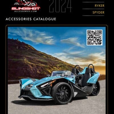Sleek three-wheeled vehicle showcased in a rugged outdoor setting.