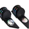 IMG_4626 Two black camera lens caps with colorful rings and attached magnifying glasses.