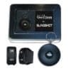 Slingbox device with remote and power adapter for streaming TV content.