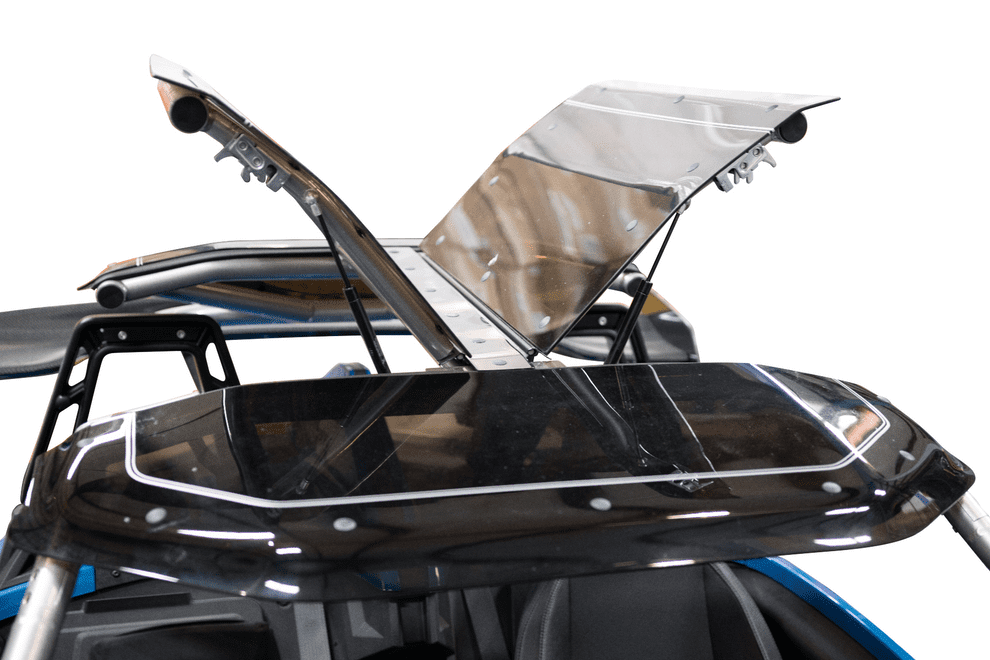 img_0856-3 Open sunroof on a black vehicle with protective cover.
